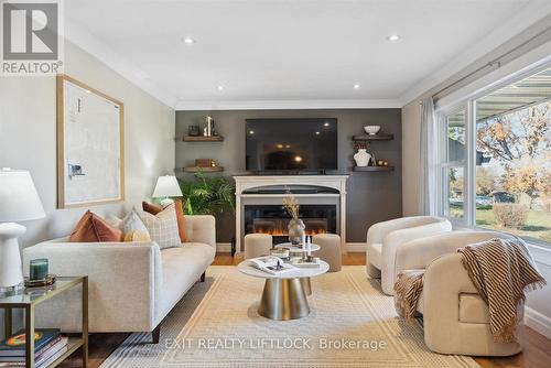 577 Spillsbury Drive, Peterborough (Otonabee), ON - Indoor Photo Showing Living Room With Fireplace