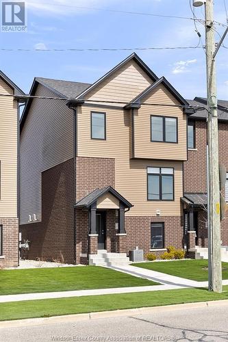 741 Brownstone, Lakeshore, ON - Outdoor With Facade