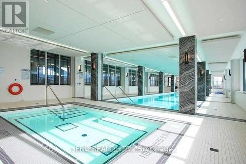 403 - 20 Shore Breeze Drive, Toronto, ON - Indoor Photo Showing Other Room With In Ground Pool