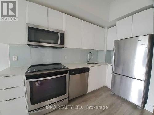 403 - 20 Shore Breeze Drive, Toronto, ON - Indoor Photo Showing Kitchen