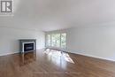 38 Cartier Crescent, Toronto, ON  - Indoor Photo Showing Living Room With Fireplace 