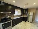 Upper - 165 Vodden Street E, Brampton, ON  - Indoor Photo Showing Kitchen With Double Sink 