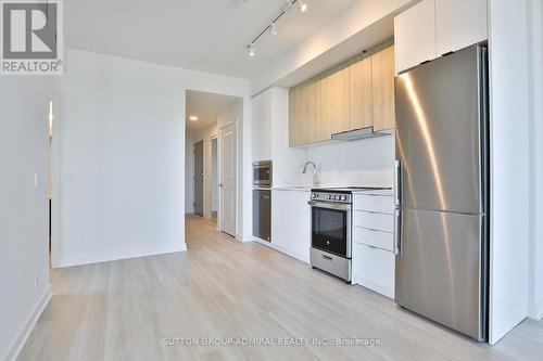 1810A - 30 Upper Mall Way, Vaughan, ON - Indoor Photo Showing Kitchen