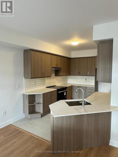 131B-2 - 153 Seguin Street, Richmond Hill, ON - Indoor Photo Showing Kitchen With Double Sink