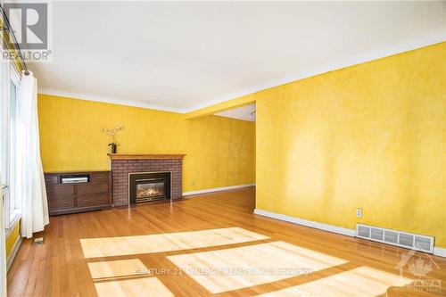 2725 Kelly Avenue, Ottawa, ON - Indoor Photo Showing Living Room With Fireplace