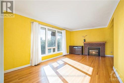 2725 Kelly Avenue, Ottawa, ON - Indoor Photo Showing Living Room With Fireplace