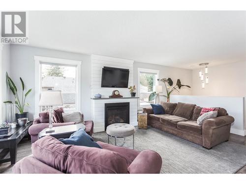 2629 Balsam Lane, Lumby, BC - Indoor Photo Showing Living Room With Fireplace