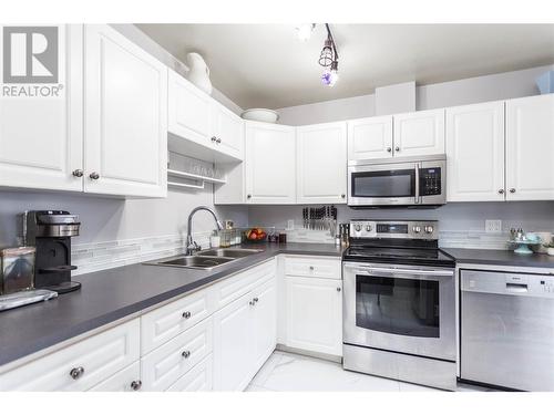 2629 Balsam Lane, Lumby, BC - Indoor Photo Showing Kitchen With Double Sink