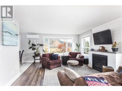 2629 Balsam Lane, Lumby, BC - Indoor Photo Showing Living Room With Fireplace