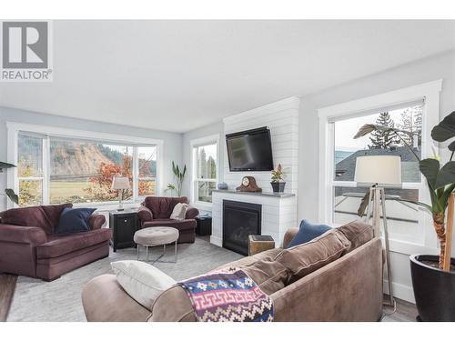 2629 Balsam Lane, Lumby, BC - Indoor Photo Showing Living Room With Fireplace