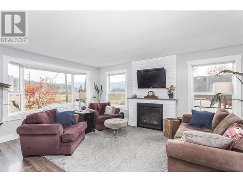 2629 Balsam Lane, Lumby, BC - Indoor Photo Showing Living Room With Fireplace