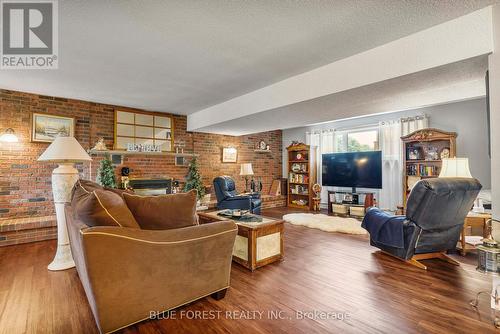 10996 Furnival Road, West Elgin (Rodney), ON - Indoor Photo Showing Living Room With Fireplace