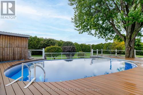 10996 Furnival Road, West Elgin (Rodney), ON - Outdoor With In Ground Pool