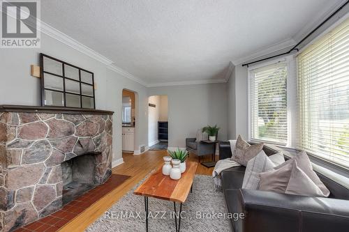 59 Harmony Road N, Oshawa (Eastdale), ON - Indoor Photo Showing Living Room With Fireplace