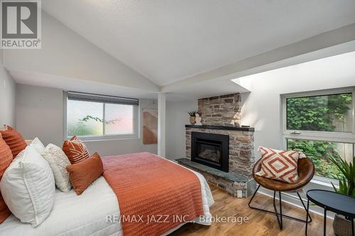 59 Harmony Road N, Oshawa (Eastdale), ON - Indoor Photo Showing Bedroom With Fireplace