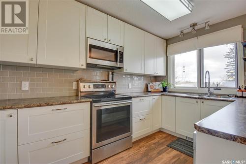 34 Howard Crescent, Lanigan, SK - Indoor Photo Showing Kitchen With Double Sink