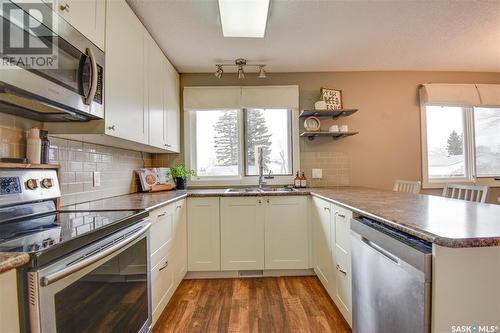 34 Howard Crescent, Lanigan, SK - Indoor Photo Showing Kitchen With Double Sink