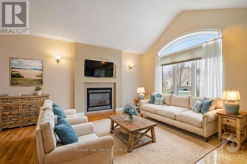 9 Pebblemill Lane, Russell, ON - Indoor Photo Showing Living Room With Fireplace