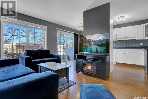 4950 Marigold Drive, Regina, SK - Indoor Photo Showing Living Room With Fireplace