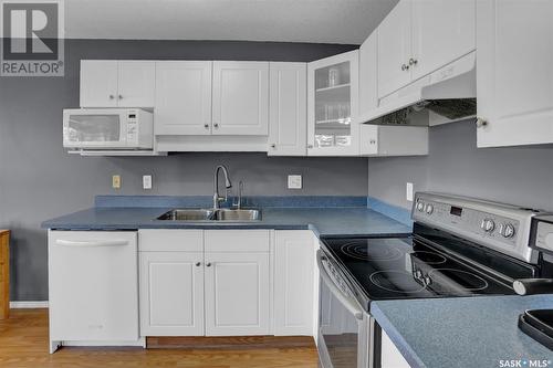 4950 Marigold Drive, Regina, SK - Indoor Photo Showing Kitchen With Double Sink