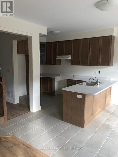 18 Ladysmith Street, Brampton, ON - Indoor Photo Showing Kitchen With Double Sink