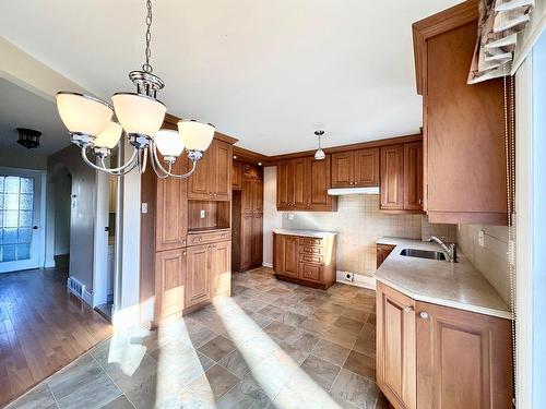 Kitchen - 6105 Boul. Milan, Brossard, QC - Indoor Photo Showing Kitchen