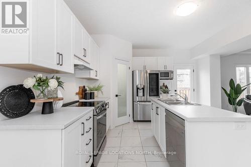 111 Plewes Drive, Collingwood, ON - Indoor Photo Showing Kitchen With Stainless Steel Kitchen With Double Sink With Upgraded Kitchen