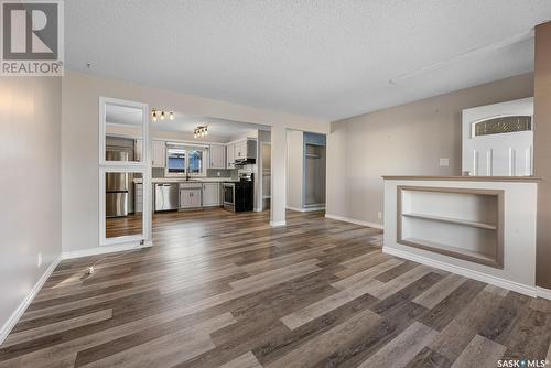 1419 Dover Avenue, Regina, SK - Indoor Photo Showing Living Room With Fireplace