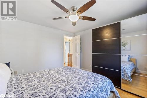 Bedroom with hardwood / wood-style floors and ceiling fan - 2604 Homelands Drive, Mississauga, ON - Indoor Photo Showing Bedroom