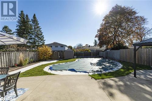 View of swimming pool featuring a storage unit and a patio area - 2604 Homelands Drive, Mississauga, ON - Outdoor With Backyard