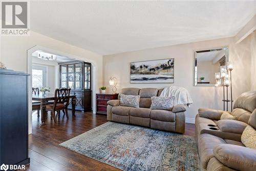 Living room with dark hardwood / wood-style floors - 2604 Homelands Drive, Mississauga, ON - Indoor Photo Showing Living Room