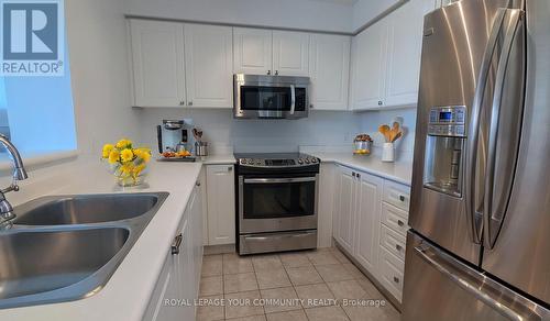 Ph108 - 1 Lee Centre Drive, Toronto, ON - Indoor Photo Showing Kitchen With Double Sink