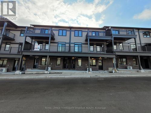 18 Oat Lane, Kitchener, ON - Outdoor With Balcony With Facade