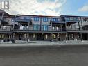 18 Oat Lane, Kitchener, ON  - Outdoor With Balcony With Facade 