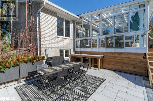 View of patio / terrace featuring a grill and a sunroom - 18133 Loyalist Parkway, Prince Edward County, ON - Outdoor With Deck Patio Veranda