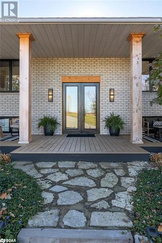 Property entrance featuring a wooden deck - 18133 Loyalist Parkway, Prince Edward County, ON - Outdoor