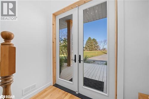 Entryway with french doors and light hardwood / wood-style flooring - 18133 Loyalist Parkway, Prince Edward County, ON -  Photo Showing Other Room