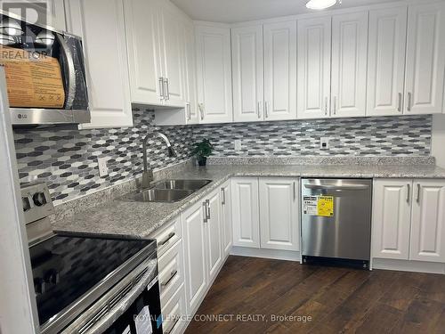 Ph 5 - 60 Pavane Linkway, Toronto, ON - Indoor Photo Showing Kitchen With Double Sink With Upgraded Kitchen