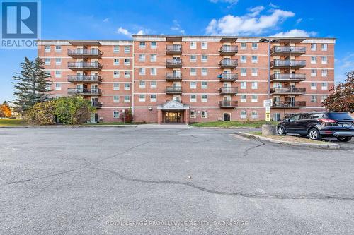 209 - 745 Davis Drive, Kingston (East Gardiners Rd), ON - Outdoor With Balcony With Facade