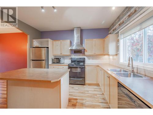 2208 Westside Park Avenue, Invermere, BC - Indoor Photo Showing Kitchen With Double Sink