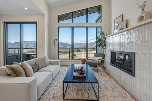 102-1100 Antler Drive, Penticton, BC - Indoor Photo Showing Living Room With Fireplace