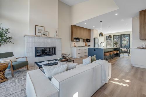 102-1100 Antler Drive, Penticton, BC - Indoor Photo Showing Living Room With Fireplace