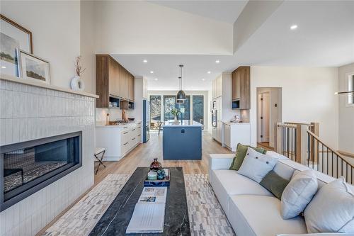 102-1100 Antler Drive, Penticton, BC - Indoor Photo Showing Living Room With Fireplace