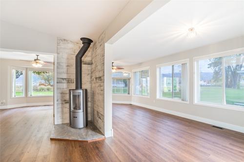 57 Kingfisher Drive, Penticton, BC - Indoor Photo Showing Other Room With Fireplace