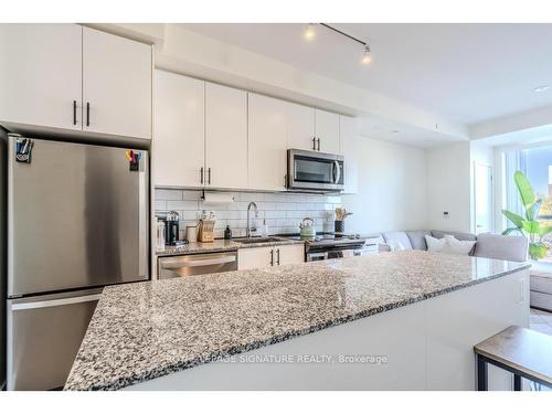 216-168 Sabina Dr, Oakville, ON - Indoor Photo Showing Kitchen With Stainless Steel Kitchen With Upgraded Kitchen