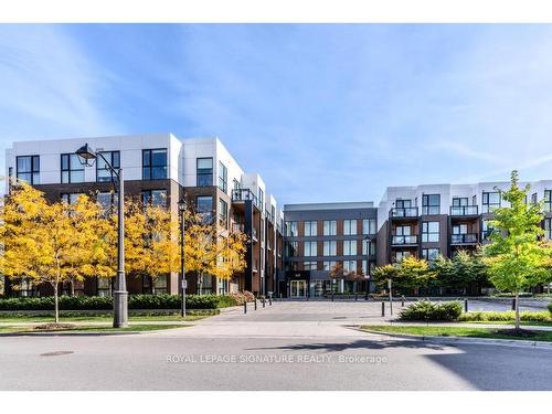 216-168 Sabina Dr, Oakville, ON - Outdoor With Balcony With Facade