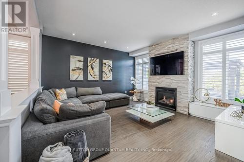 309 Vienna Street, Hamilton, ON - Indoor Photo Showing Living Room With Fireplace