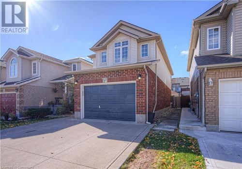 Front facade with a garage - 83 Bridlewreath Street, Kitchener, ON - Outdoor