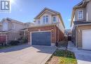 Front facade with a garage - 83 Bridlewreath Street, Kitchener, ON  - Outdoor 