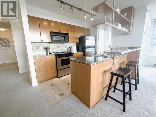 2502 1438 Richards Street, Vancouver, BC - Indoor Photo Showing Kitchen With Double Sink